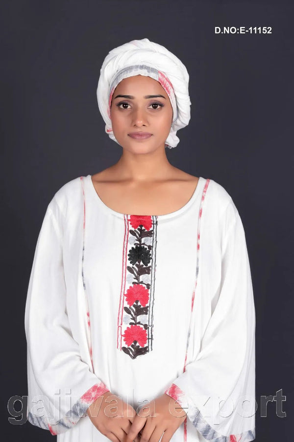 Elegant White kaftan with Detailed Floral Yoke Embroidery- غاجي والا إكسبورت Gajiwala Export