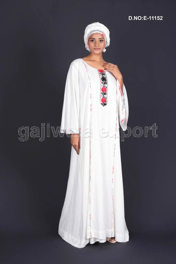 Elegant White kaftan with Detailed Floral Yoke Embroidery- غاجي والا إكسبورت Gajiwala Export