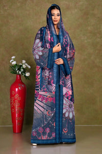 Woman wearing a blue floral shrug with a matching headscarf gajiwala export