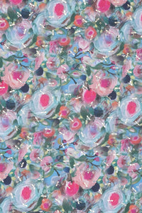 Colorful floral pattern with pink, blue, and green flowers fabric.