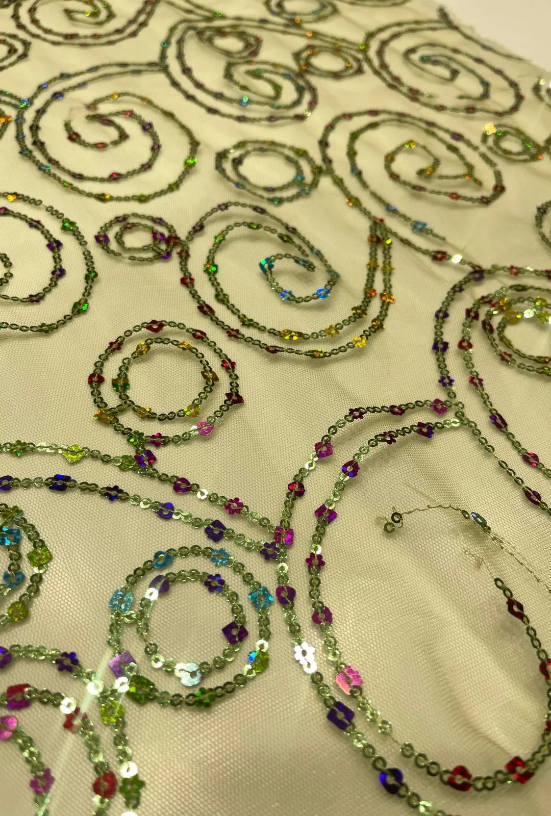Concentric Spiral Sequence Embroidered Net Fabric