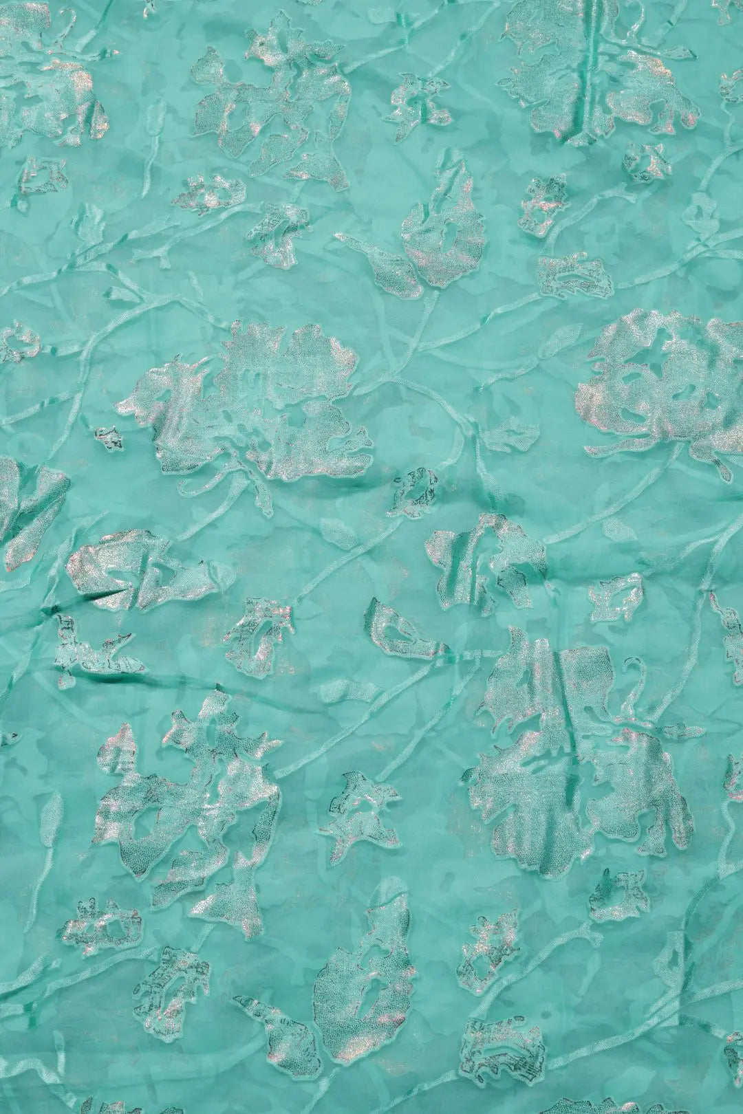 Elegant Brasso Fabric with Intricate Foil Patterns