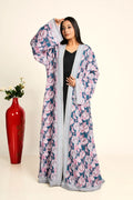 Woman wearing a floral kimono-style garment