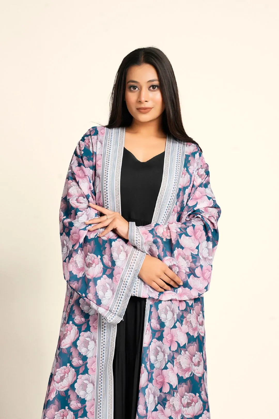 Woman wearing a floral kimono-style garment