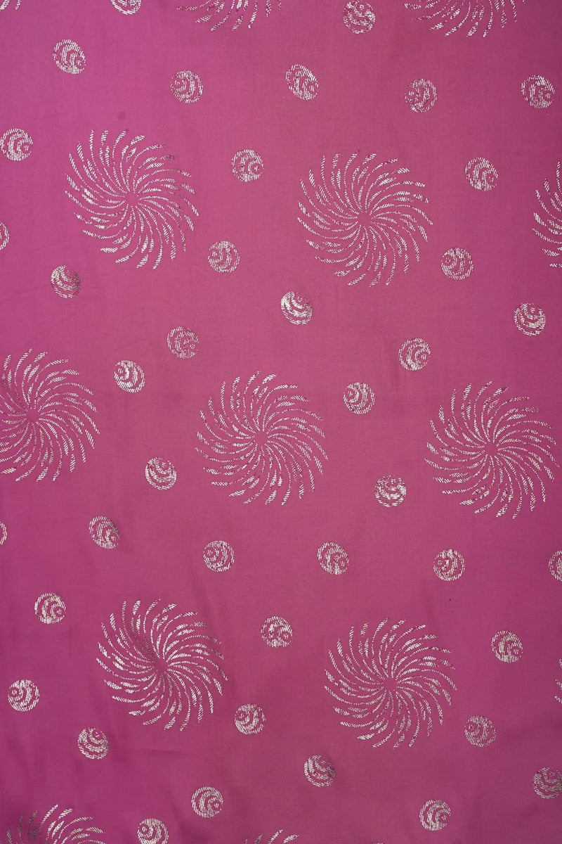 Patterned fabric with white swirl designs Pink Armani Satin With Foil Work Fabric