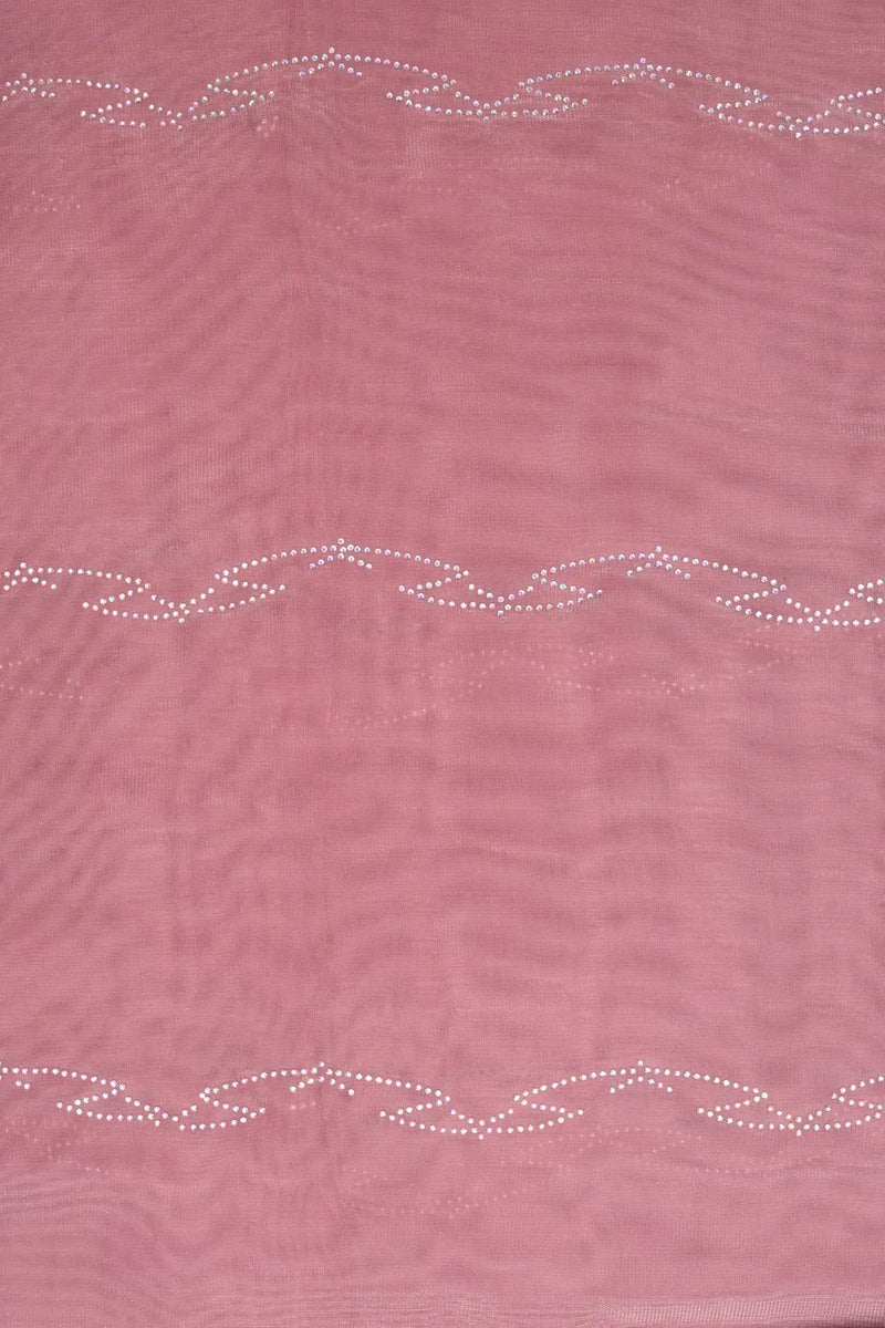 Pink fabric with decorative white stitching pattern
