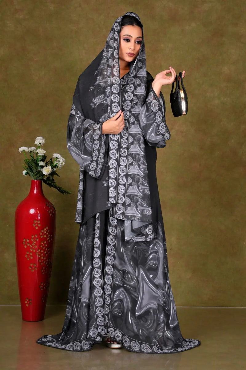 Woman in a black and gray patterned shrug gajiwala export