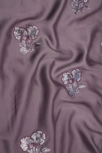 Purple fabric with floral embroidery