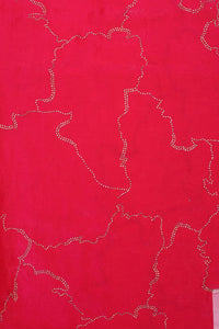 Red fabric with silver thread patterns