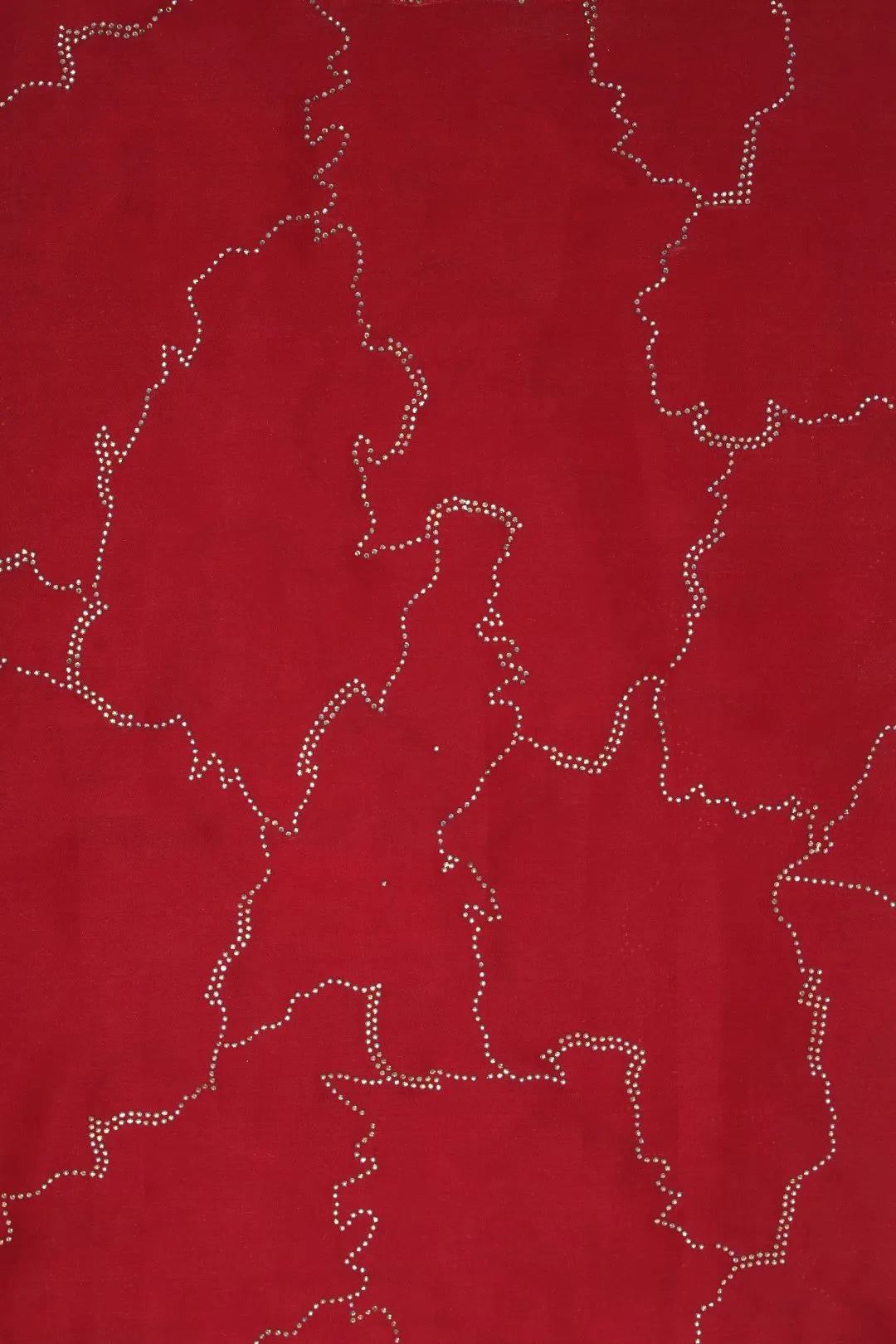 Red fabric with wavy white pattern