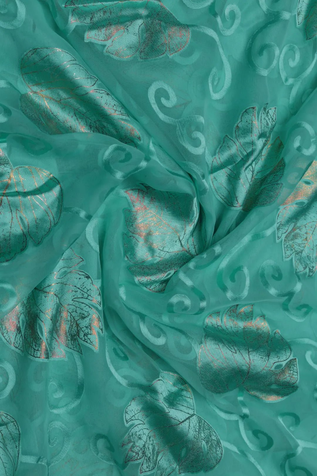 Brasso fabric with Shimmering Copper - Teal Foil Leaves - غاجي والا إكسبورت Gajiwala Export