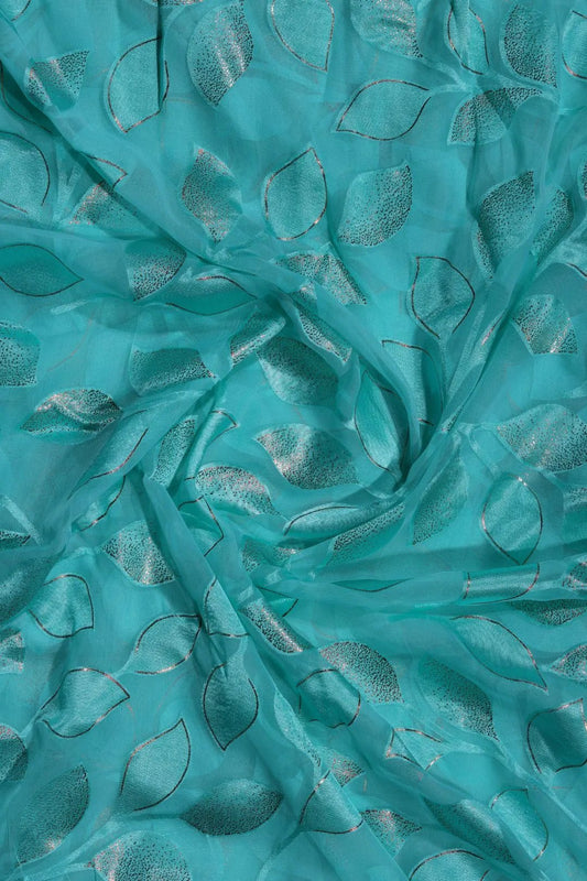 Brasso fabric with Sparkling Blue and Leaf Foil - غاجي والا إكسبورت Gajiwala Export