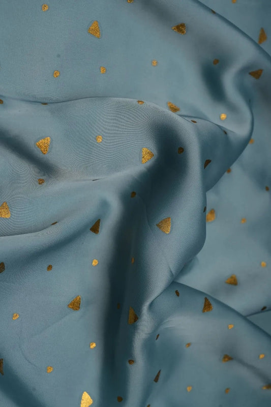 Soft Blue Fabric with Scattered Metallic Gold Foil Print - غاجي والا إكسبورت Gajiwala Export