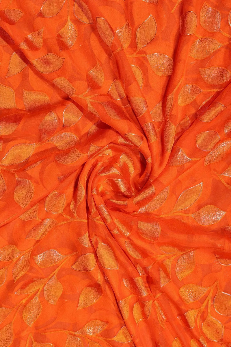 Orange Brasso fabric  with Shimmering Trailing Leaf Motif - غاجي والا إكسبورت Gajiwala Export