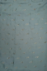 Sky Blue Fabric with Scattered Silver Floral Buti - غاجي والا إكسبورت Gajiwala Export