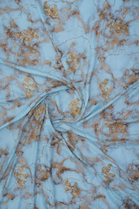 Sky Blue Fabric Marbled Viscose with Gold Thread Accents - غاجي والا إكسبورت Gajiwala Export
