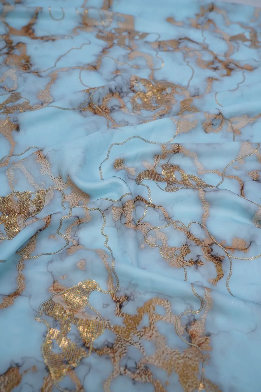 Sky Blue Fabric Marbled Viscose with Gold Thread Accents - غاجي والا إكسبورت Gajiwala Export